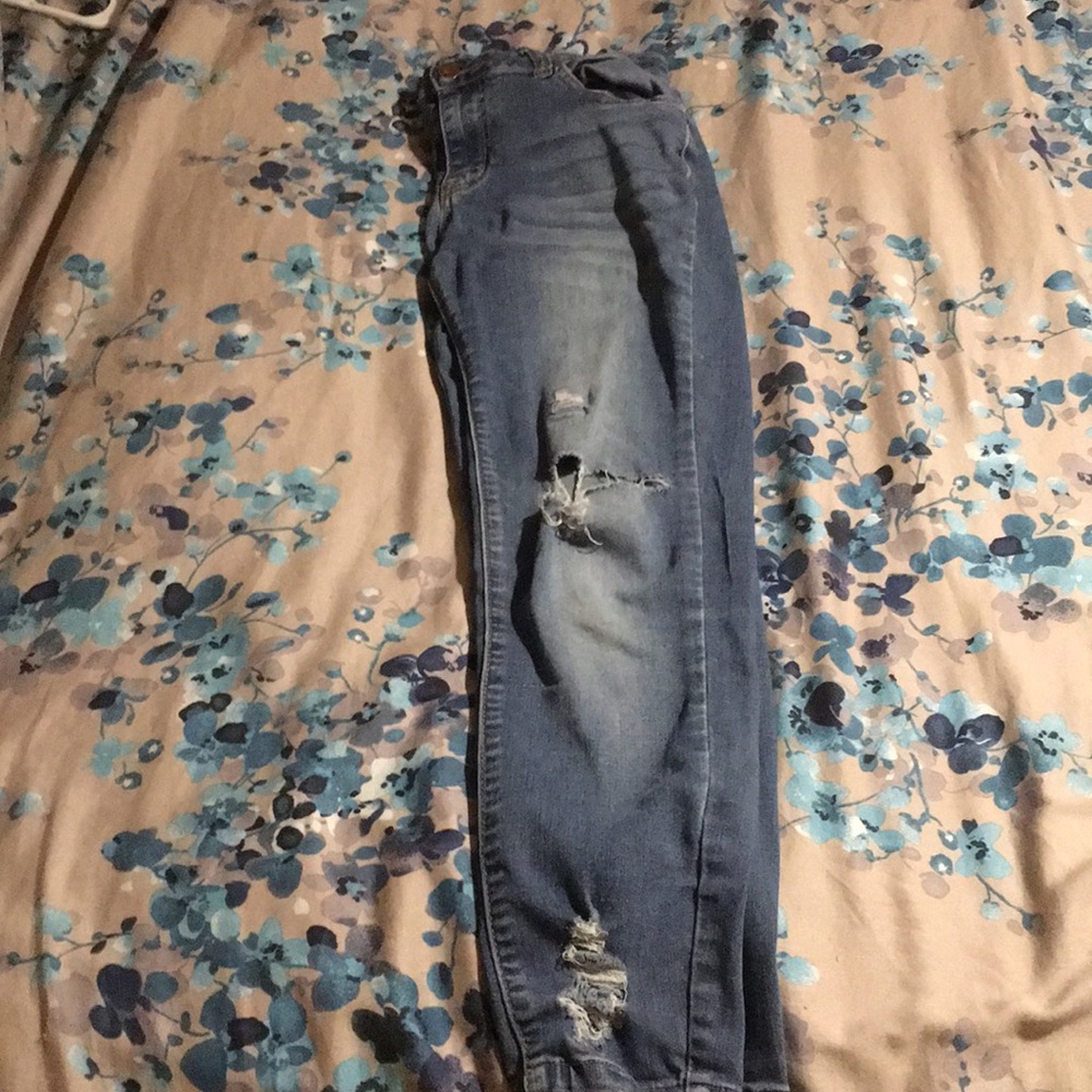 Ripped blue jeans. Offers are always welcome